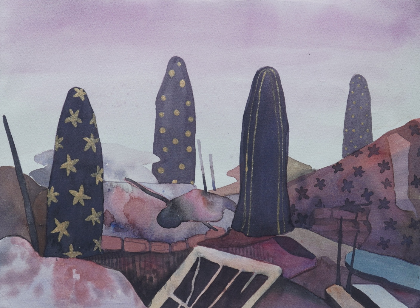 Untitled-7, watercolour and acrylic gold on paper, 11 x 15 inches, 2024. A landscape of tall, narrow obelisk-like forms — some patterned with gold stars, others plain dark or polka-dotted — rise from a rubble-strewn, violet-pink ground beneath a hazy dusky sky. The work reads as both ruin and monument: an elegiac, futurist vision of what stands after destruction.